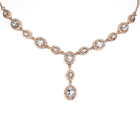 Collar de Plata Bañada en Oro con Topacio Azul Cielo y Topacio Blanco