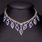 Conjunto de Aleación Bañado en Oro con Cristal Emporia® Azul y Cristal Emporia® Blanco ( Collar +Pendientes )
