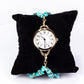 Reloj de Aleación Bañado en Oro con Turquesa y Amatista ( Pulsera )