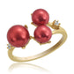 Anillo de Plata Bañada en Oro con Perla roja de río y Topacio Blanco
