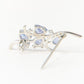 Broche de Plata con Tanzanita AAA y Topacio Blanco