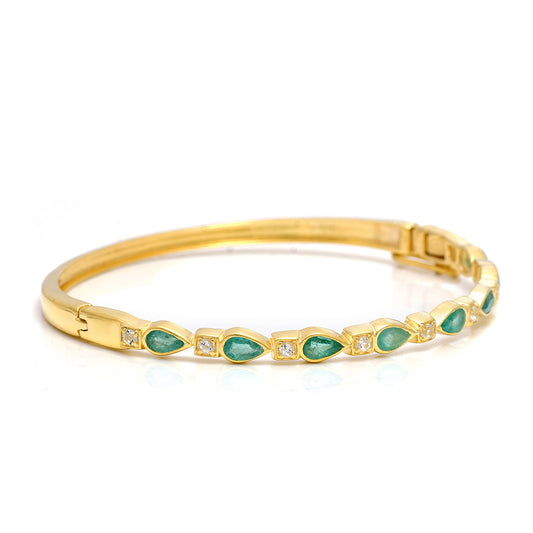 Brazalete de Plata Bañada en Oro con Esmeralda de Brasil y Topacio Blanco