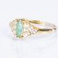 Anillo de Plata Bañada en Oro con Esmeralda de Brasil y Topacio Blanco