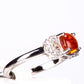Anillo de Plata con Ópalo Naranja de Lega Dembi y Topacio Blanco