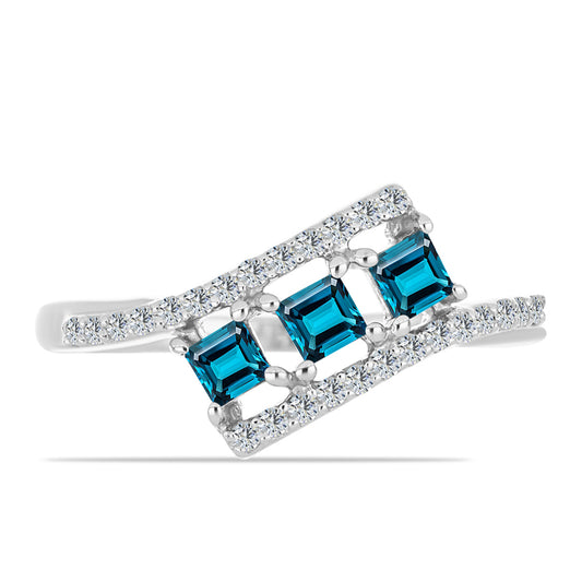 Anillo de Plata con Topacio Azul Londres y Topacio Blanco
