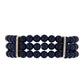 Pulsera de Plata Bañada en Oro con Ónix negro de Suwar y Topacio Blanco