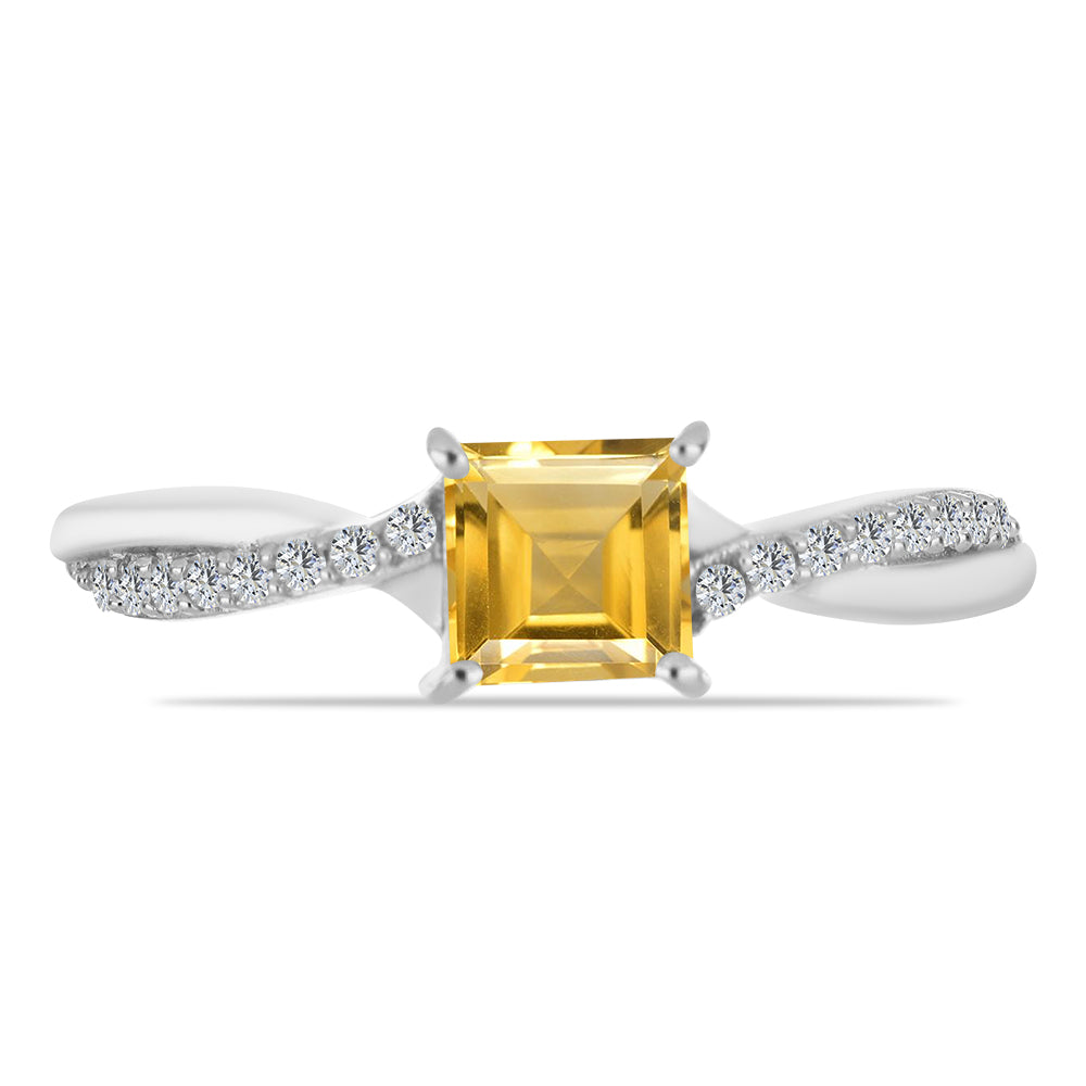 Anillo de Plata con Citrino de los Montes Urales y Topacio Blanco