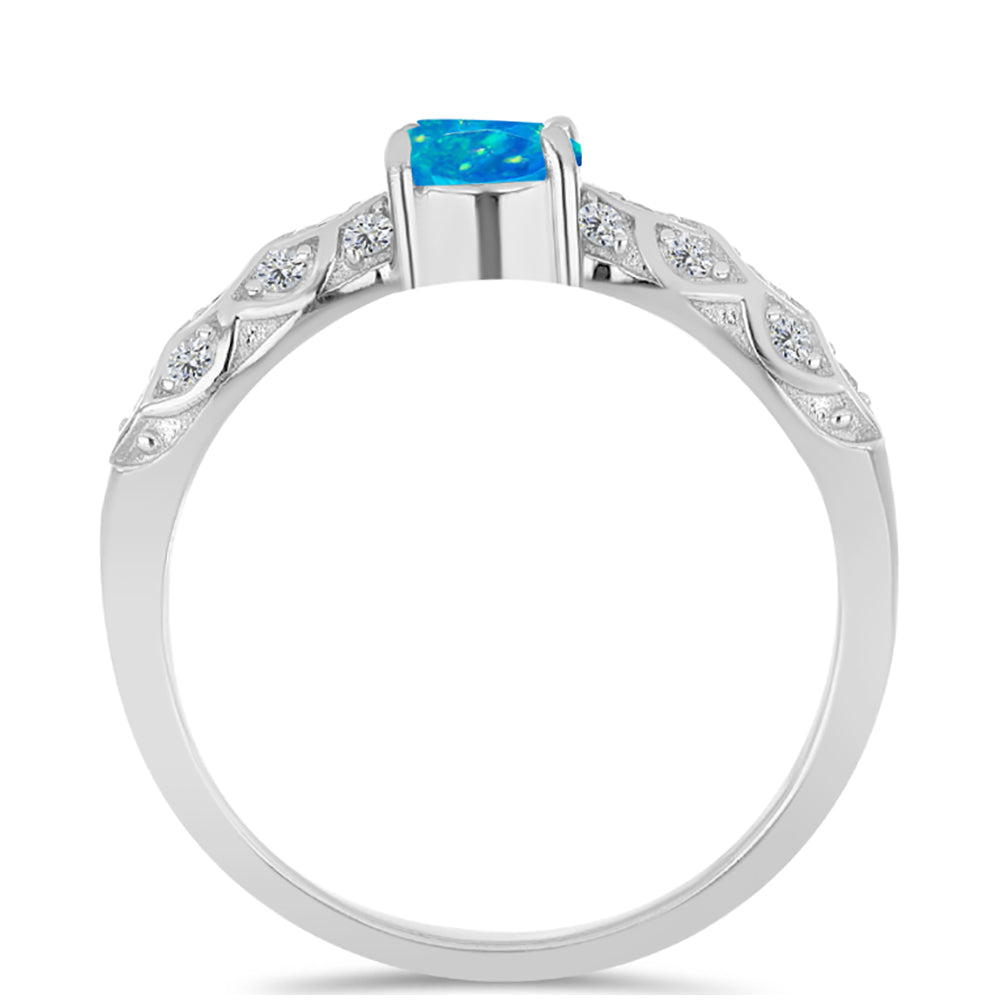Anillo de Plata con Ópalo Azul Paraiba de Etiopía y Topacio Blanco